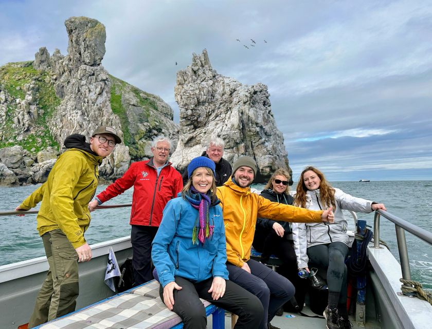 Dublin: Howth Coastal Boat Tour With Irelands Eye Ferries - Enjoying Seafood Along the Pier