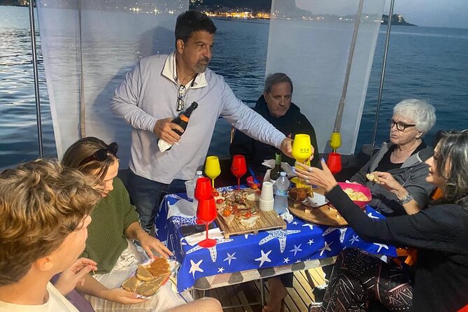 Sunset on a Boat in PalermoWith Palermo by Boat - Identification Documentation