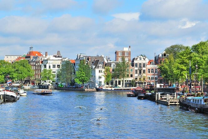 Amsterdam Small-Group Open Boat Tour Off The Beaten Track - Key Points