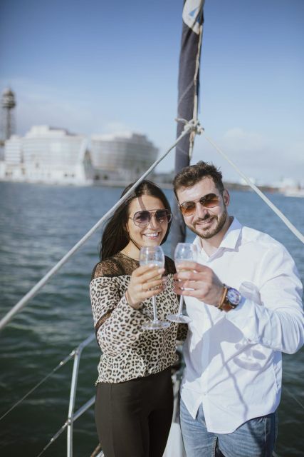 Barcelona: Sunset Sailboat Cruise With Open Bar - Key Points