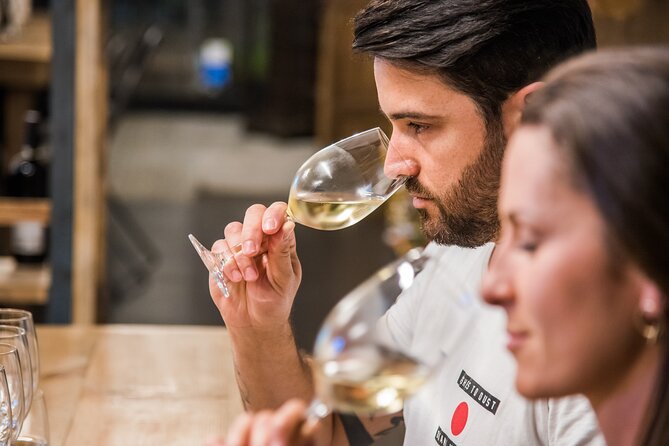 Barcelona: Wine Tasting & 5 Course Tapas Pairing Dinner - Key Points