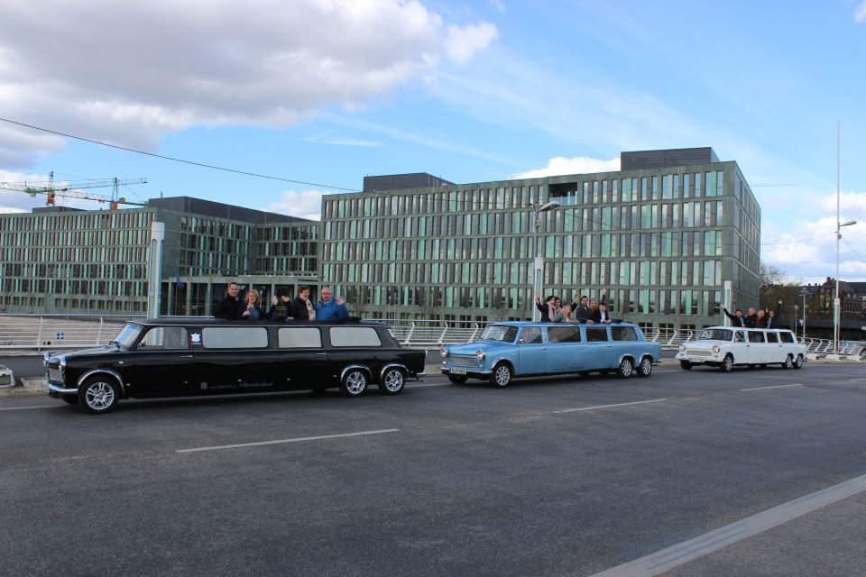 Berlin: Trabi Limousine Airport Transfer With City Tour - Key Points