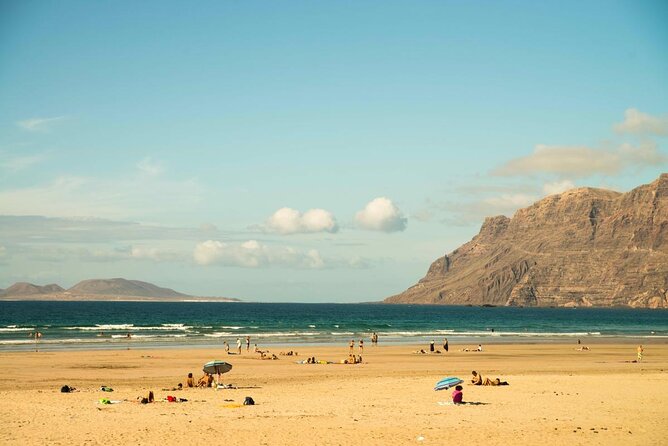 Full Day Surf Lesson for Beginners in Famara, Spain - Key Points