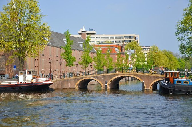 Luxury Boat Tour in Amsterdam With Bar on Board - Key Points