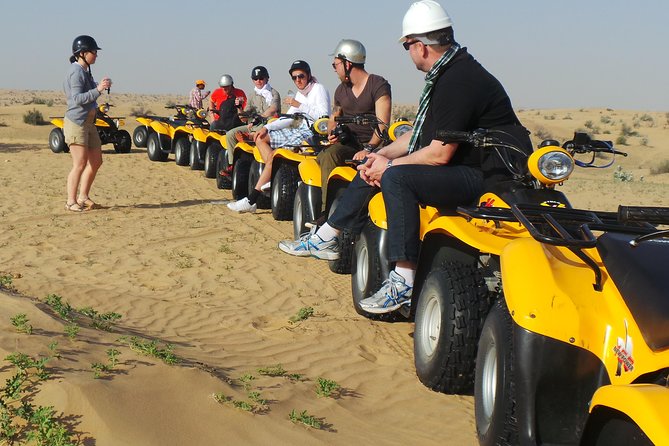 Dubai Desert Afternoon Quad Safari With Camel Ride, Bbq Dinner And Belly Dancing Quad Bike Desert Safari