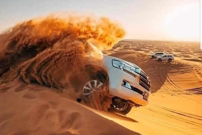 Dubai Desert Safari With Camel Ride, Sand Surf, & BBQ Dinner - Camel Ride and Sand Surfing Experiences