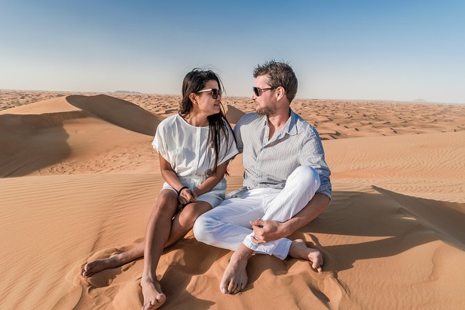 Dubai Red Dune Desert Safari, Camels, Sandboarding & Bbq Options Tour Overview