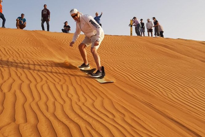 Dune Bashing With Quad Bike And Sand Boarding From Dubai Thrilling Quad Bike Adventure