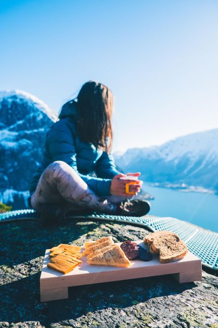 Enjoy A Cliff Picnic In The Fjord Landscape Of Norway The Breathtaking Fjord Landscape