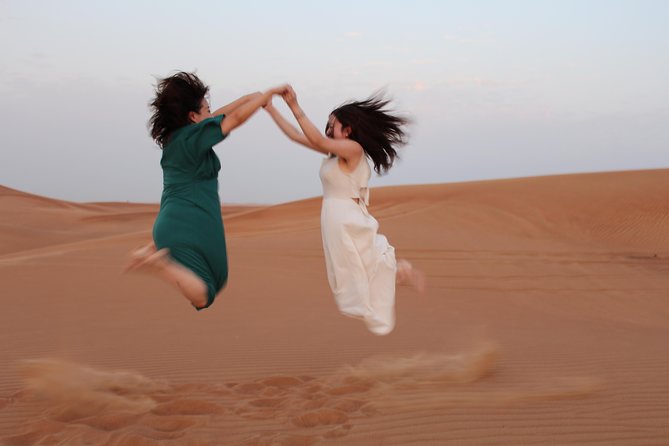 Evening Desert Safari On Red Dunes + Sandboarding + Bbq Dinner & Entertainment Overview And Highlights