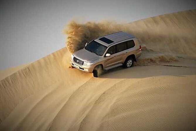 Half Day Desert Safari And Inland Sea With Sand Boarding Camel Riding Adventure