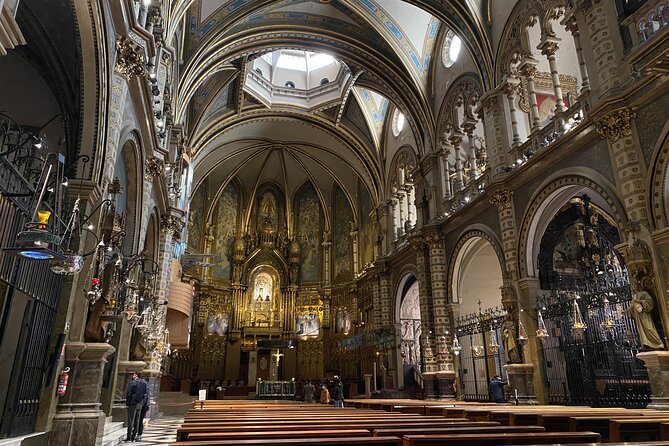 Historical Montserrat Half Day Hiking Tour From Barcelona Black Madonna Sculpture