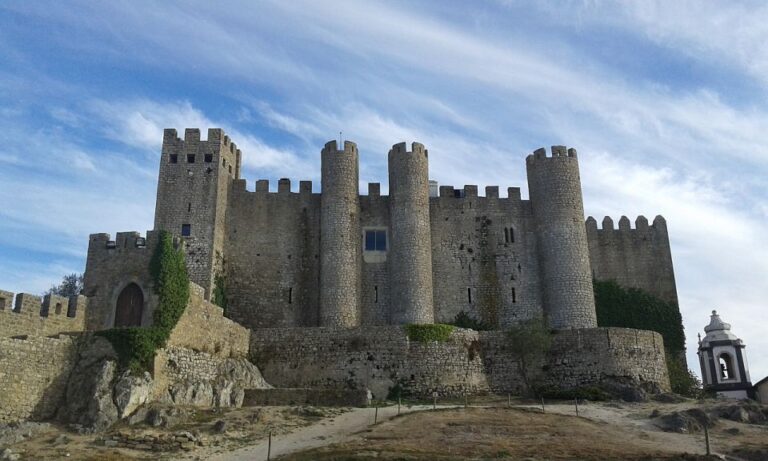 Lisbon: 1 Way Porto Transfer W/obidos, Nazare & Fatima Stops Tour Overview