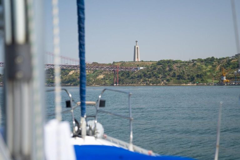 Lisbon: Sunset Sailing With Portuguese Wine And History Sailboat And Crew