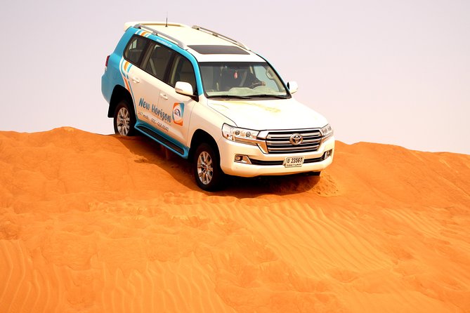 Premium Red Dune Safari, Sandboarding, Camel Ride, 5* Bbq Dinner Dune Driving Adventure