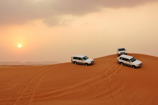 PRIVATE Dubai Desert Safari With BBQ Dinner, Camel Ride, Sand Boarding & Shows - Tour Overview