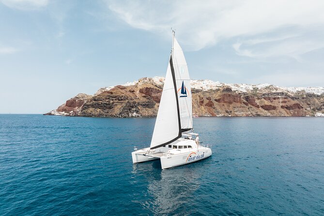 Private Morning Tour Lagoon 400-380 Sailing in Santorini ,Lunch, Drink, Transfer - Tour Highlights