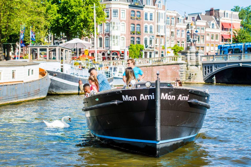 Amsterdam: Open Boat Canal Cruise With Local Guide - Tour Experience