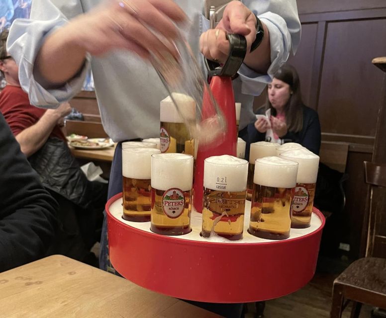 Cologne: Guided Walking Tour to 3 Old Town Breweries - Visiting the Historic Breweries