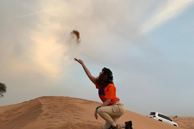 Desert Safari and Sandboarding With Dinner in Dubai - Sandboarding on Red Dunes