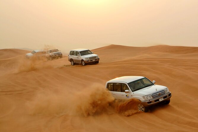 Desert Safari Experience With Dune Bashing and Dinner in Dubai - Camel Riding and Sandboarding