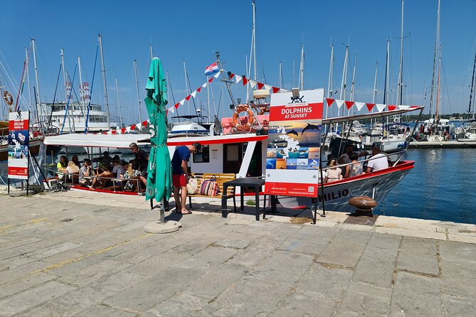 Dolphin Watching Sunset Boat Trip in Pula With Dinner - Onboard Dining Experience