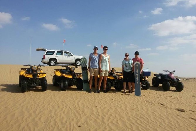 Dubai Desert Morning Tour in 4WD Vehicle: Camel Ride, Quad Bike Tour, Sandboarding, and Camel Farm - Quad Biking in the Desert