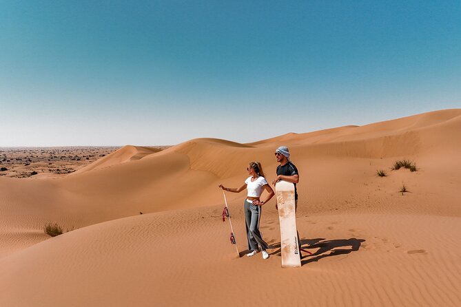 Dubai Desert Safari: Camel Ride, Sandboarding, BBQ & Soft Drinks - Pickup and Dropoff