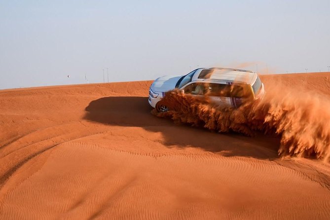 Dubai Desert Safari With BBQ and 4WD Land Cruiser Dune Bashing - Camel Ride and Sand Boarding