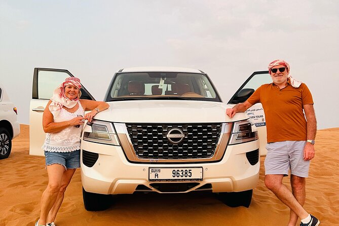 Dubai Desert Safari With Camel Ride Sand Board & BBQ Dinner - Camel Ride Across the Dunes