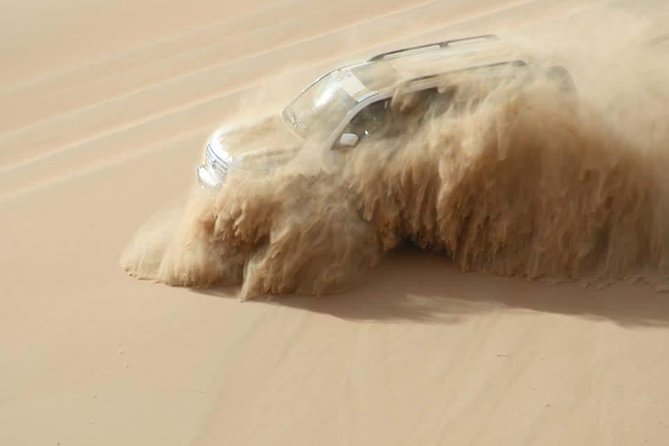 Dubai: Unique SUNSET 4WD Red Dunes Safari - Sandboarding at Sunset