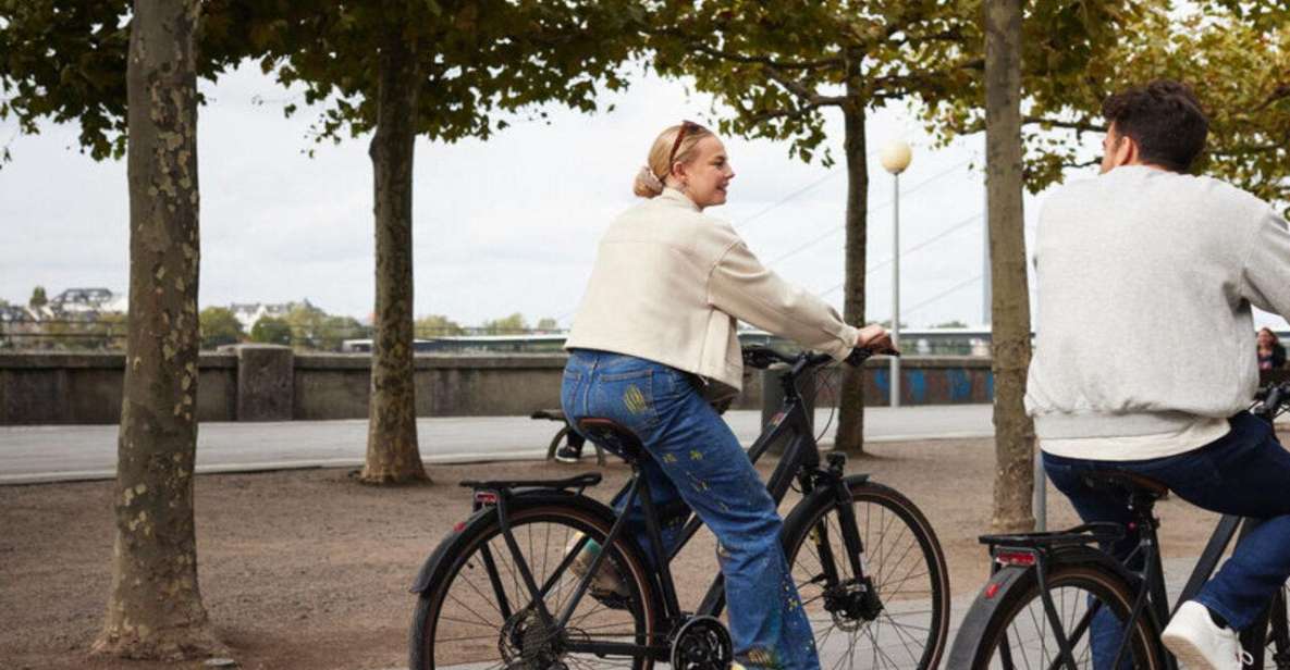 Düsseldorf: Group Biking Adventure - Exploring the Rhine Embankment Promenade