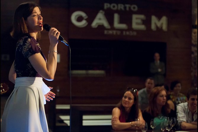 Fado Live Show in Porto Calém Wine Cellars Including Wine Tasting and Visit - Haunting Voices and Guitar