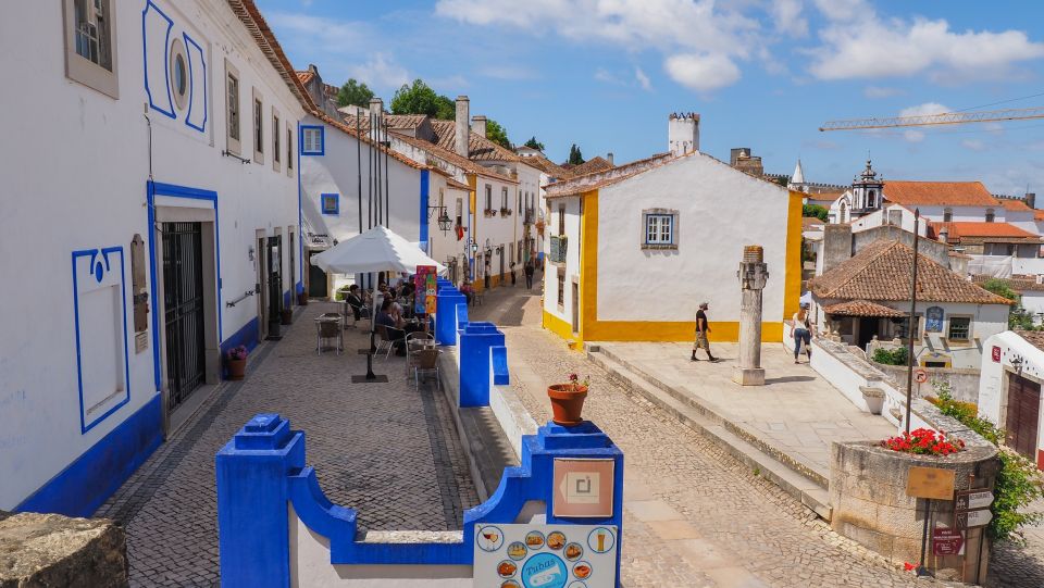 From Porto: Private Transfer to Lisbon With Stop at Óbidos - Highlights of the Trip