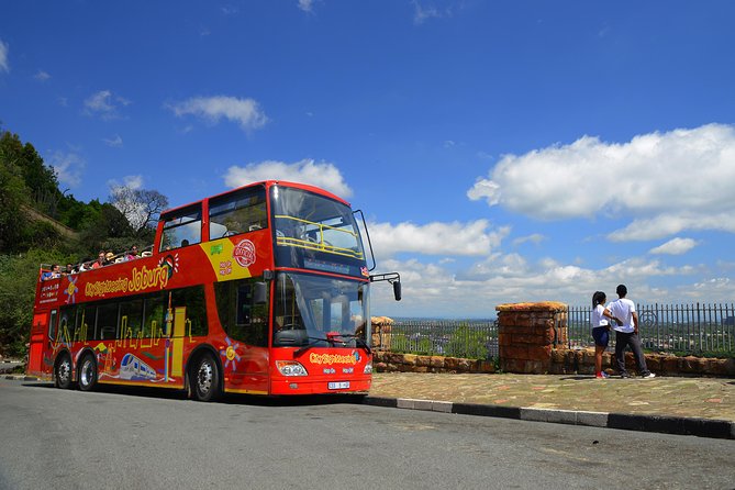 Joburg Hop-On Hop-Off Bus Tour With Apartheid Museum & Soweto - Discovering Gold Mining Legacy