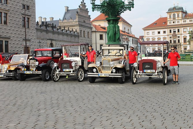 Karlstejn Castle in Vintage Convertible Car - Karlstejn Castle: A Historical Gem