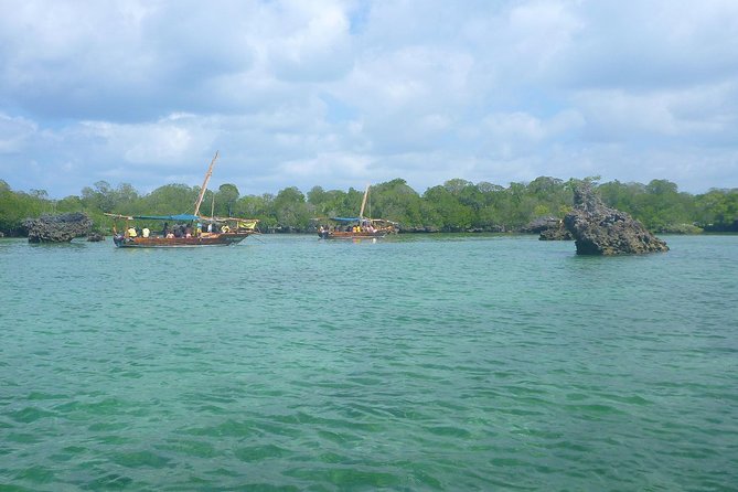 Kwale Island Dhow Sailing Tour From Zanzibar With Seafood Lunch - Snorkeling and Exploration