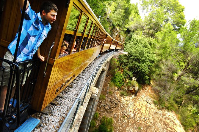 Mallorca in One Day Sightseeing Tour With Boat Ride and Vintage Train - Seaside Village of La Calobra