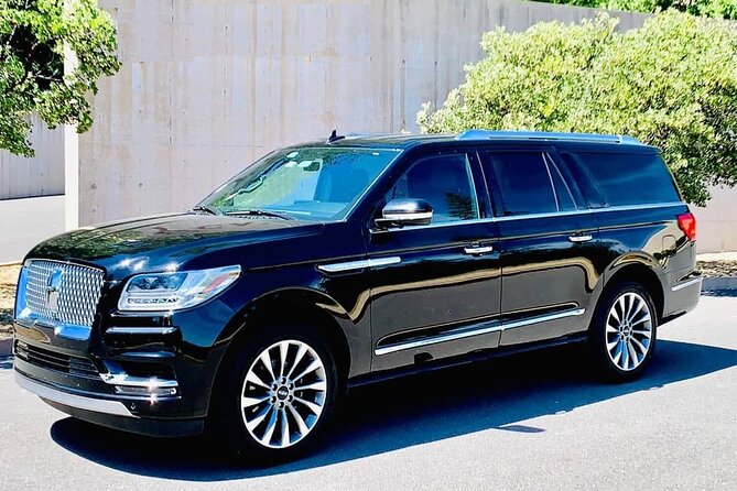 Montreal Airport YUL Private Transfer to Montreal in Luxury SUV - Complimentary Airport Waiting and Meet & Greet