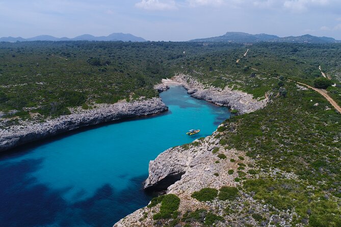 Natural Park Boat Tour and Snorkeling in Mallorca - Meeting and Pickup