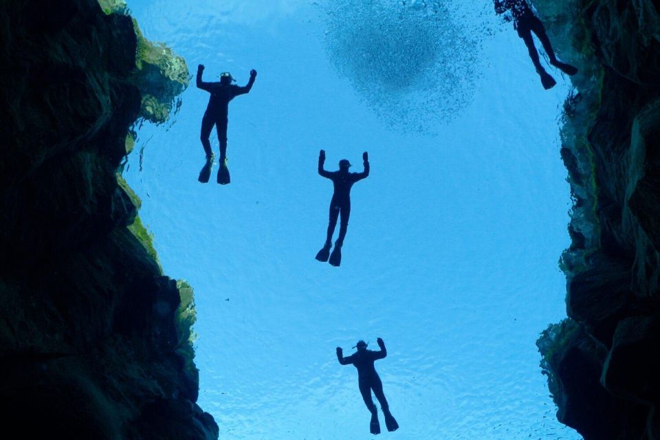 Reykjavik: Silfra Fissure Snorkeling Tour With Photo & Cocoa - Crystal-Clear Underwater Visibility