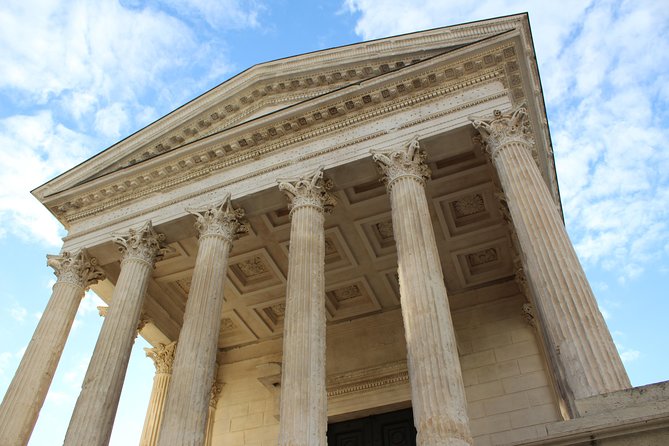 Roman Sites and Historical Places Small-Group Day Trip From Avignon - Discovering the Nimes Arena