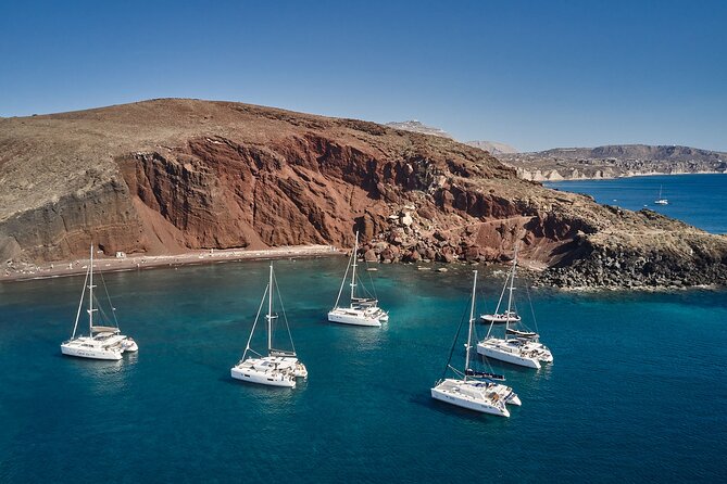 Santorini: Caldera Luxury Catamaran Cruise With Meal & Drinks - Beaches, Islands, and Volcanic Scenery