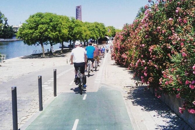 Seville Bike Tour Following the Guadalquivir River - Eco-friendly Experience