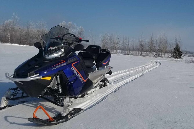 Snowmobiling Activity Rides of 1 Hour 30 - Rustic Charm and Mountain Views