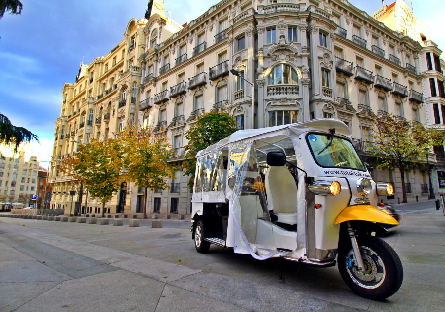 Tour With Private Guide in Tuk Tuk Through Modern Madrid - Cancellation and Reservation