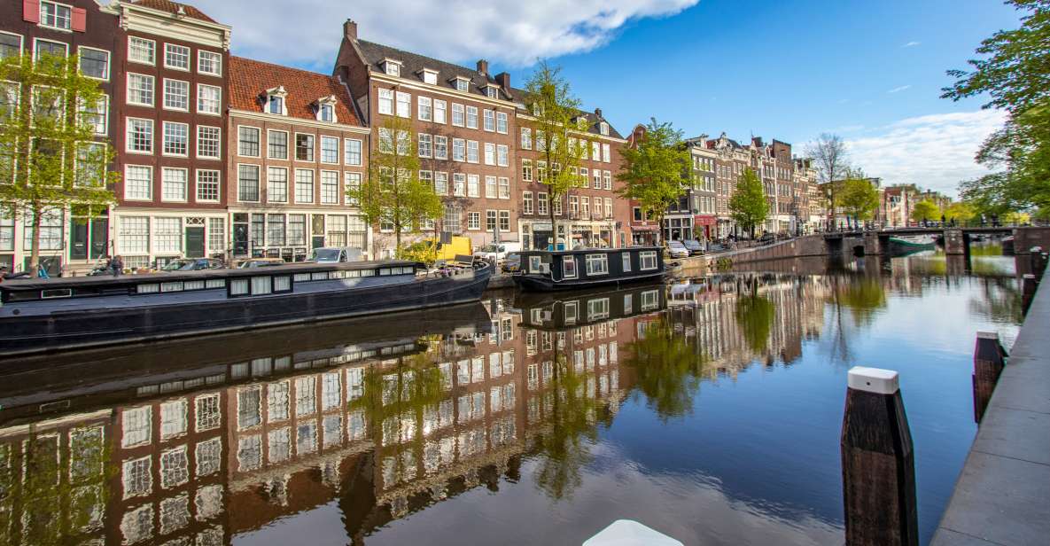 Amsterdam: Express Walk With a Local in 90 Minutes - Tour Itinerary and Activities