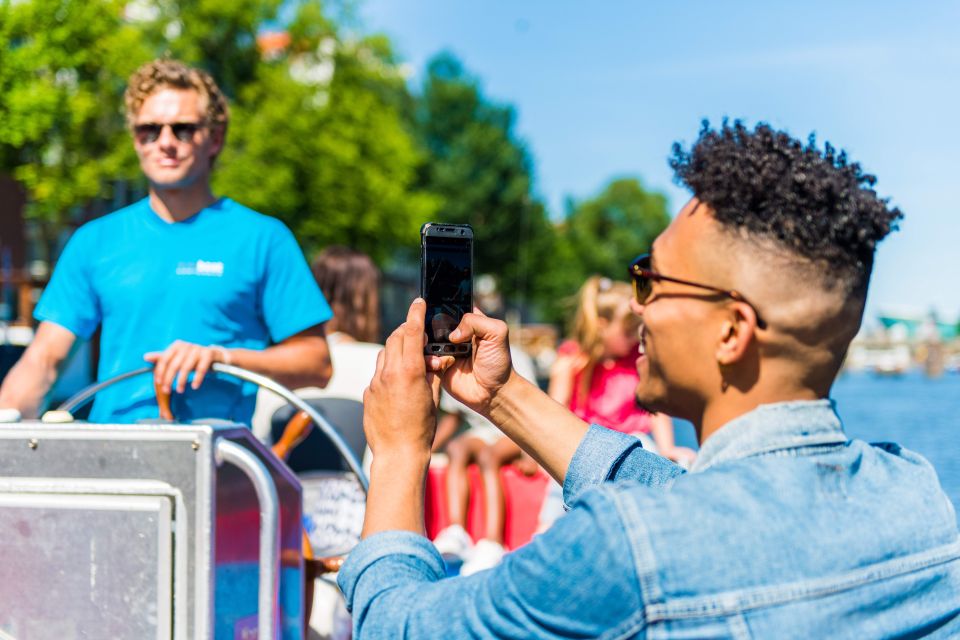 Amsterdam: Open Boat Canal Cruise With Local Guide - Itinerary Highlights