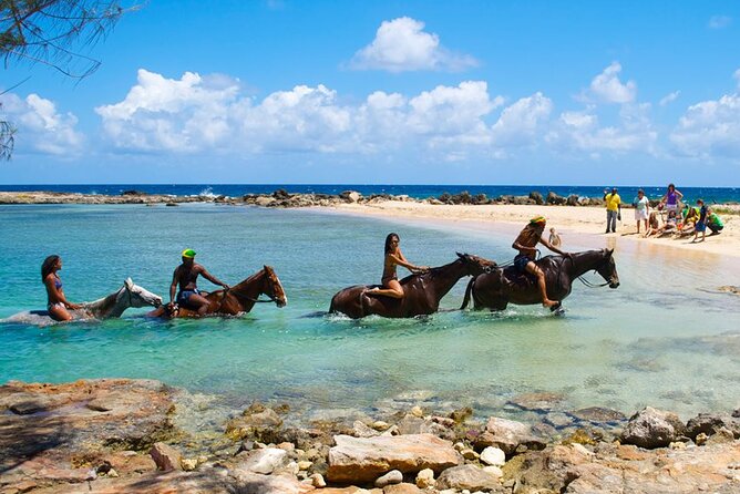 Beach Horseback Riding and River Tubing Family Adventure From Montego Bay - Meeting and Pickup