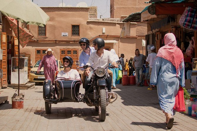 Discover Another Marrakech by Vintage Sidecar - Bottled Water and Rain Gear